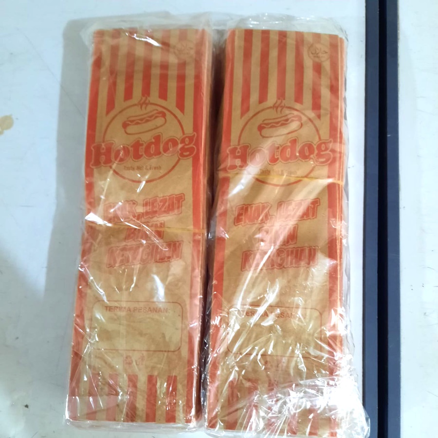 

Kertas Bungkus/Kantong Hotdog isi 50 Lembar 27 x 8 x 4 Cm