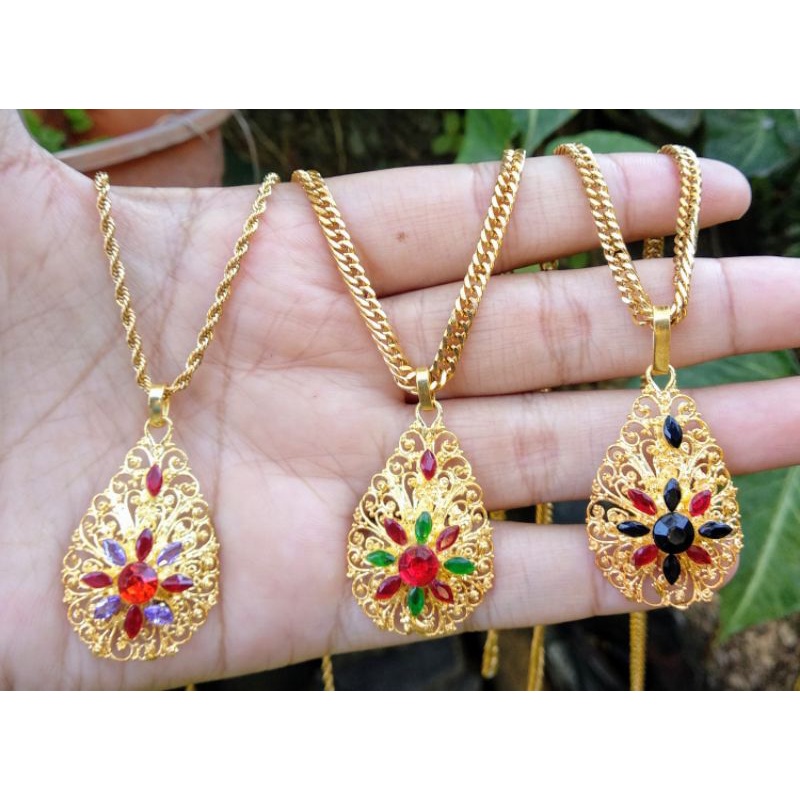 Kalung titanium mainan alpaka lapis mas