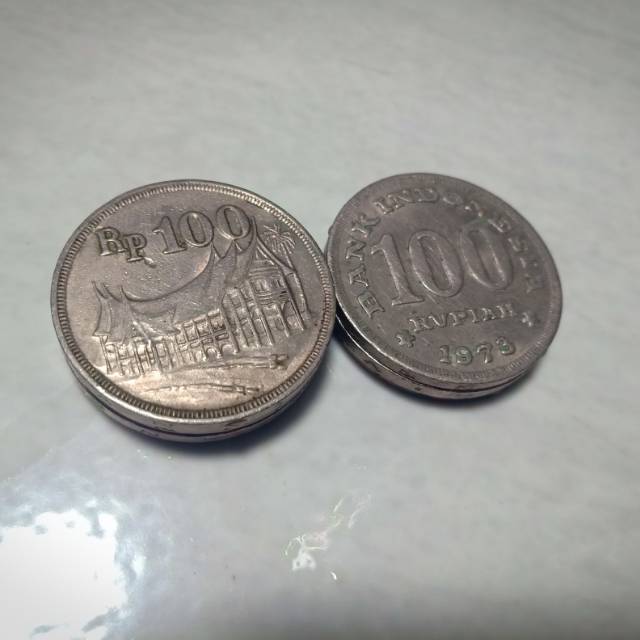 Uang logam rumah rp 100