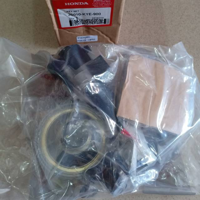 KUNCI KONTAK + TUTUP TANGKI MEGAPRO MONOSOK CARBU ASLI HGP 35010-KYE-900