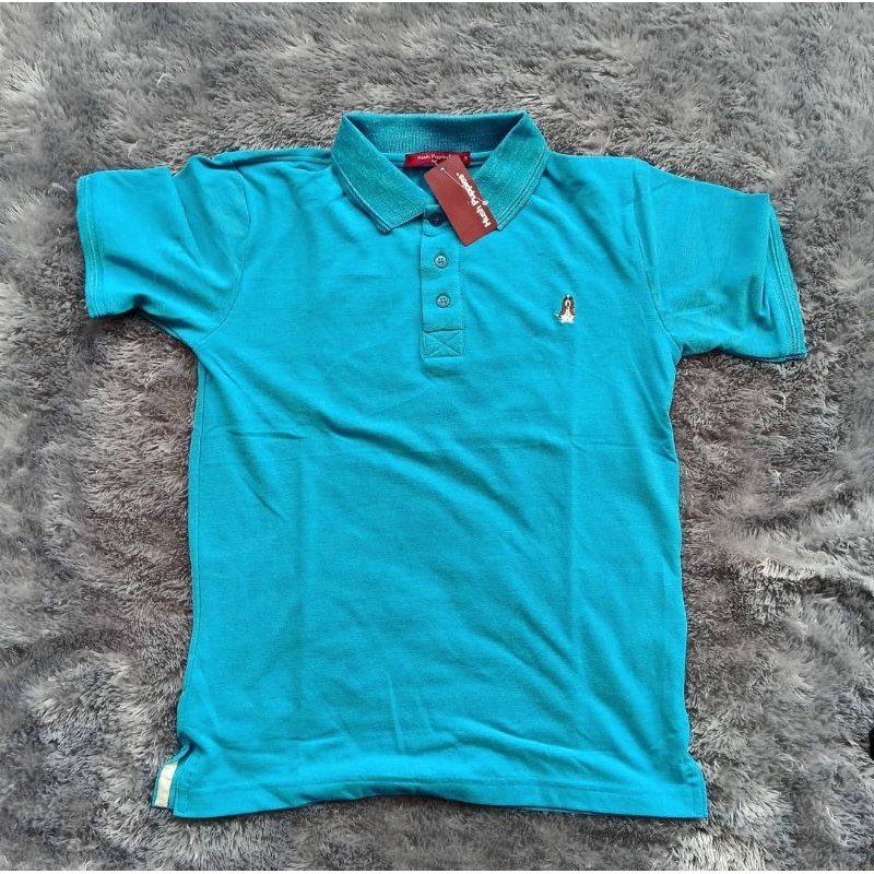 Kaos Kerah Hush Puppies