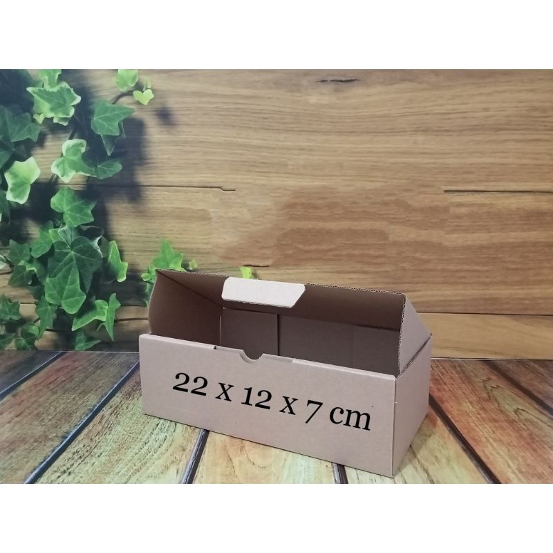 

kardus 22 x 12 x 7cm ..die cut