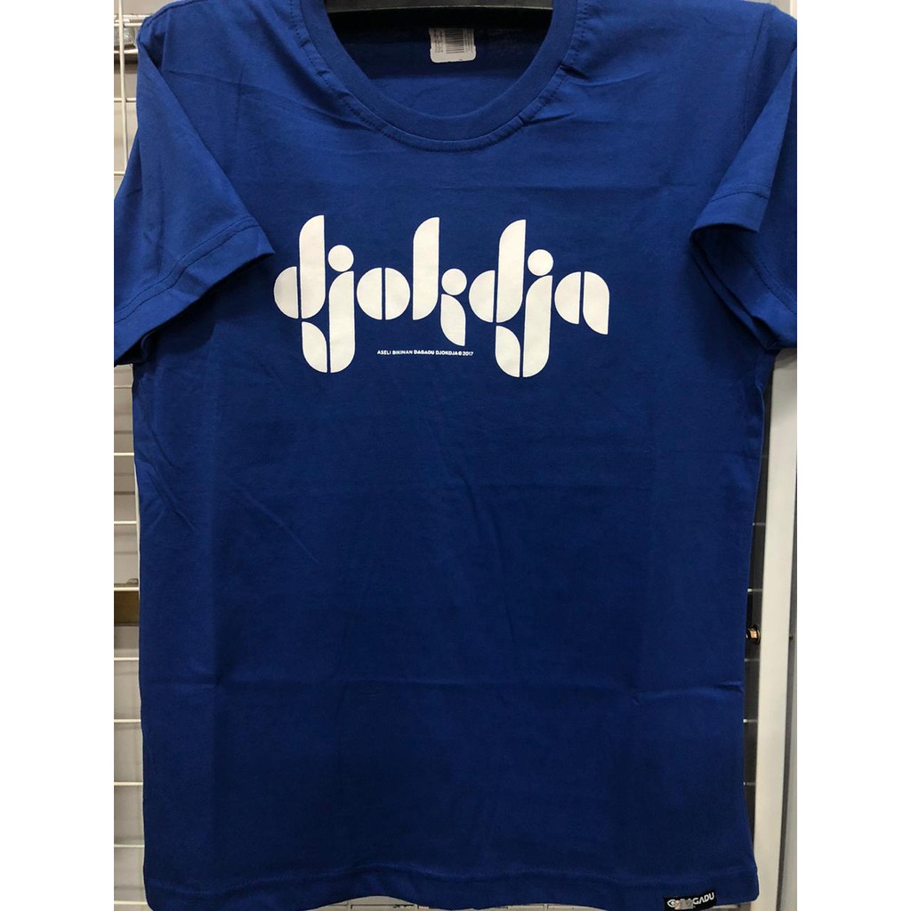 

Dagadu kaos dagadu aseli official - desain djokdja p@r@ng biru
