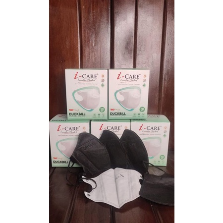 MASKER DUKBIL I CARE 4 PLAY TEBAL PUTIH DAN HITAM DALAM PUTIH MASKER DEWASA ISI 50 PCS