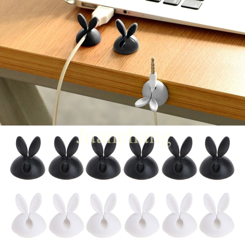 1pc Klip Holder Kabel Earphone Bentuk Telinga Kelinci Bahan Silikon