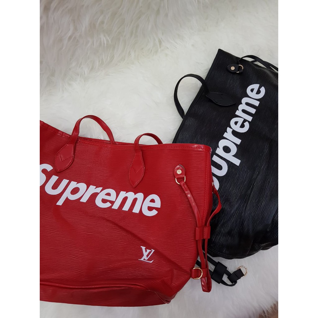 supreme x lv luggage