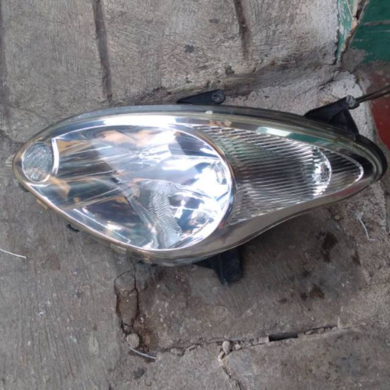 Headlamp Daihatsu Sirion