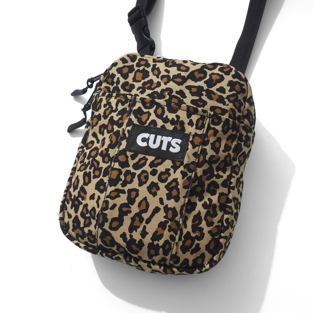 CUTS CURATES SLING BAG