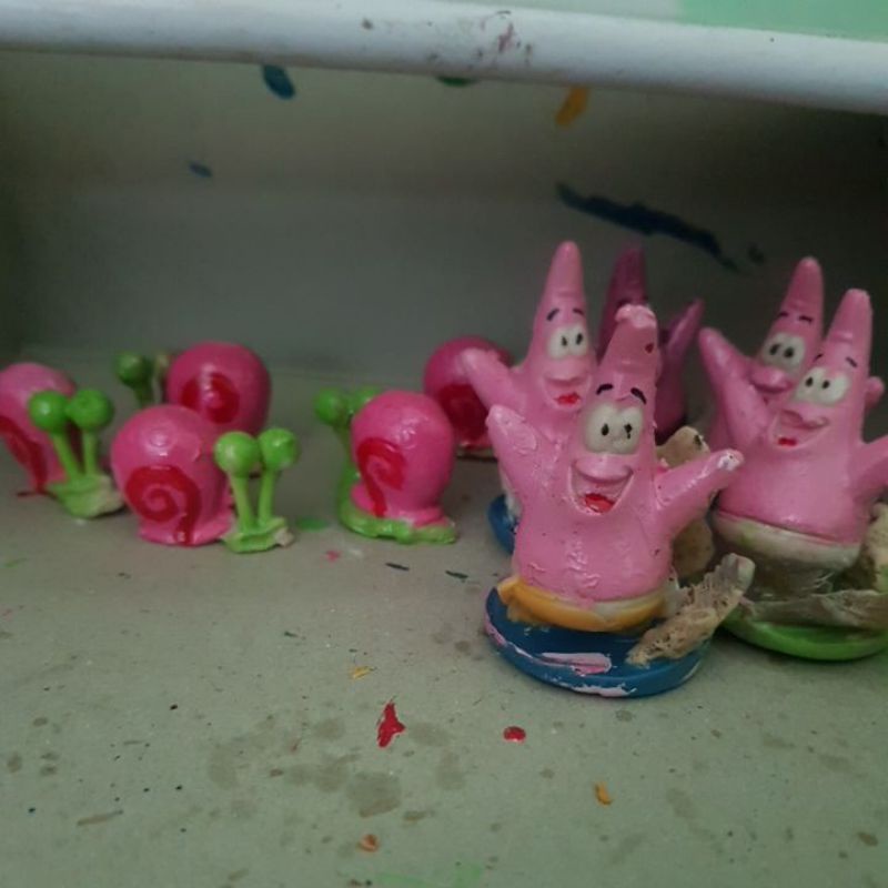 hiasan aquarium,pertrik dan gary si siput
