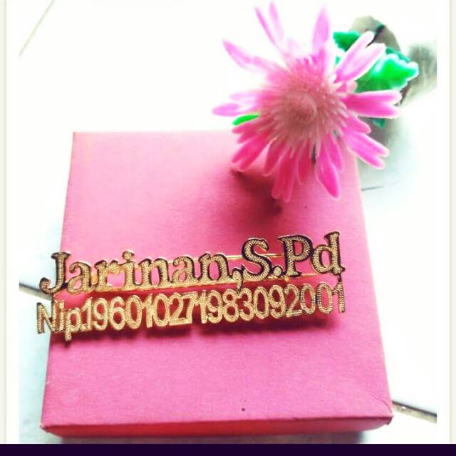 bros jilbab titanium berlapis emas.