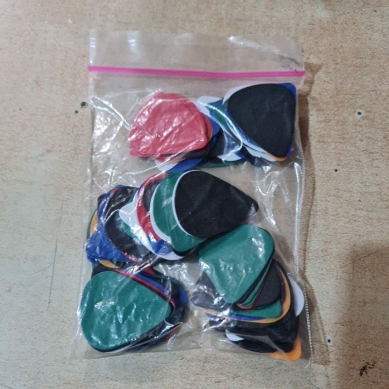 1 bungkus pick gitar isi 100 pcs ukuran 0.46mm termurah