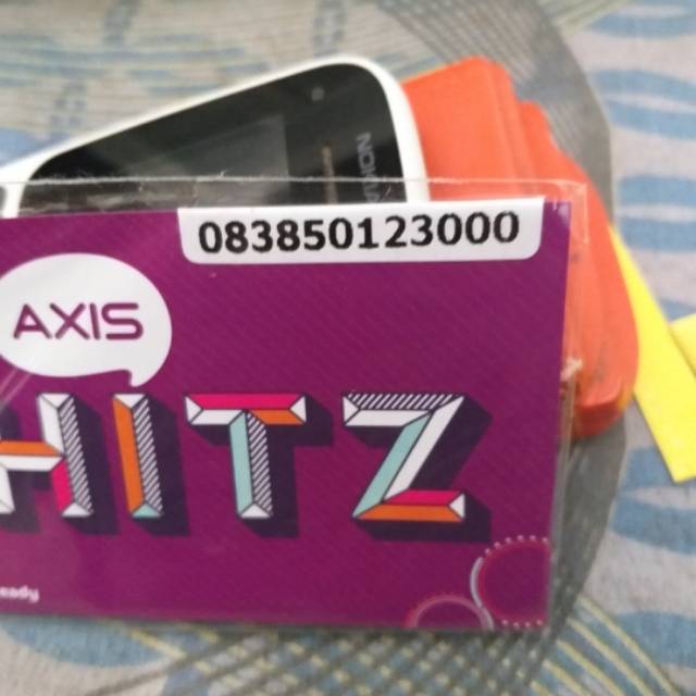 Kartu perdana nomor cantik axis seri naik triple kosong 083 850 123 000