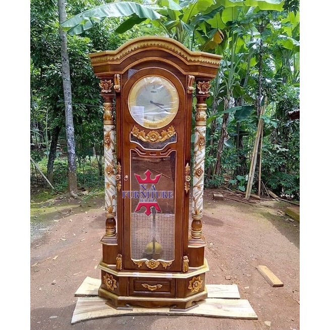 lemari jam hias kayu jati, lemari jam jati,lemari hias jati