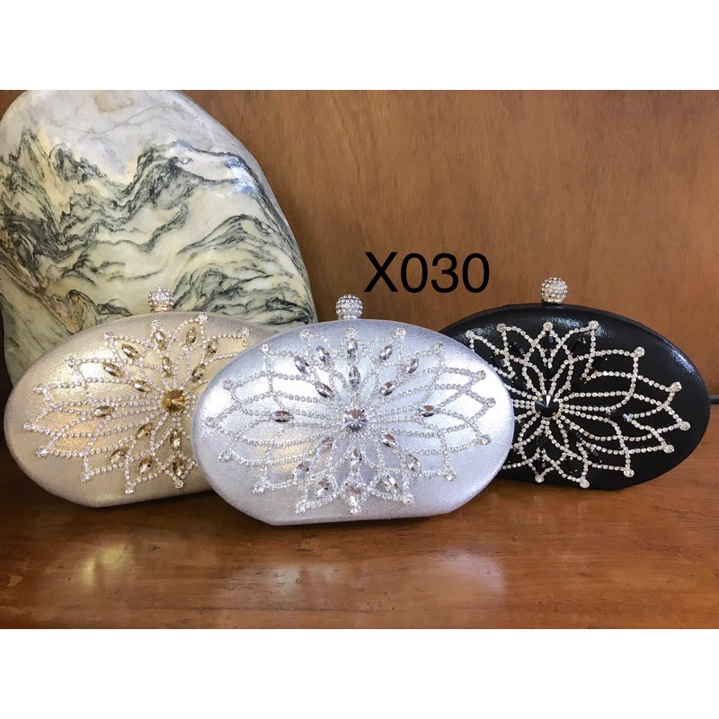 Tas pesta Clutch Lotus