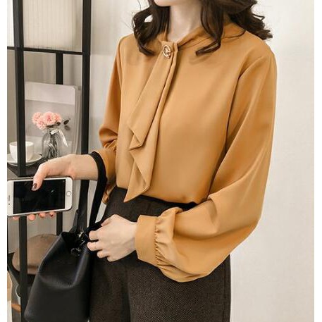 Blus Wanita Dengan Bahan Sifon Dan Hiasan Pita Bergaya Blus Wanita Dengan Bahan Sifon Dan Hiasan Pita Bergaya