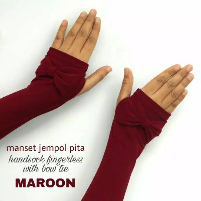 Dekker tangan jempol pita