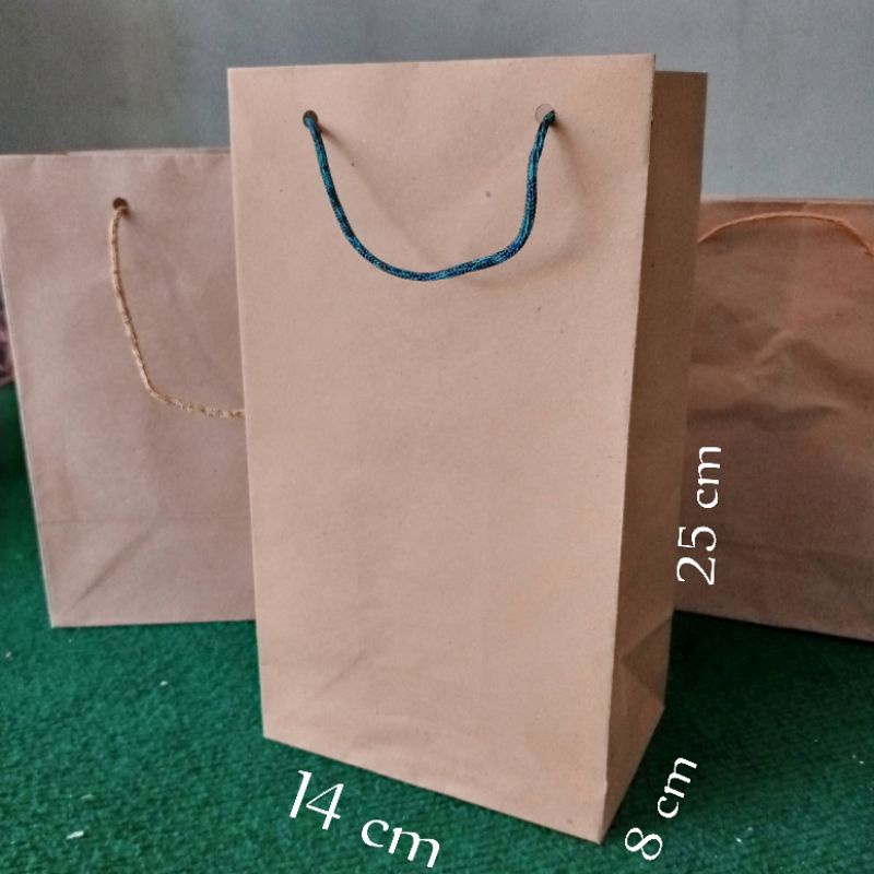 

Paper Bag 14*8*25 ( P*L*T ) Paper Bag Coklat Polos / Wafer