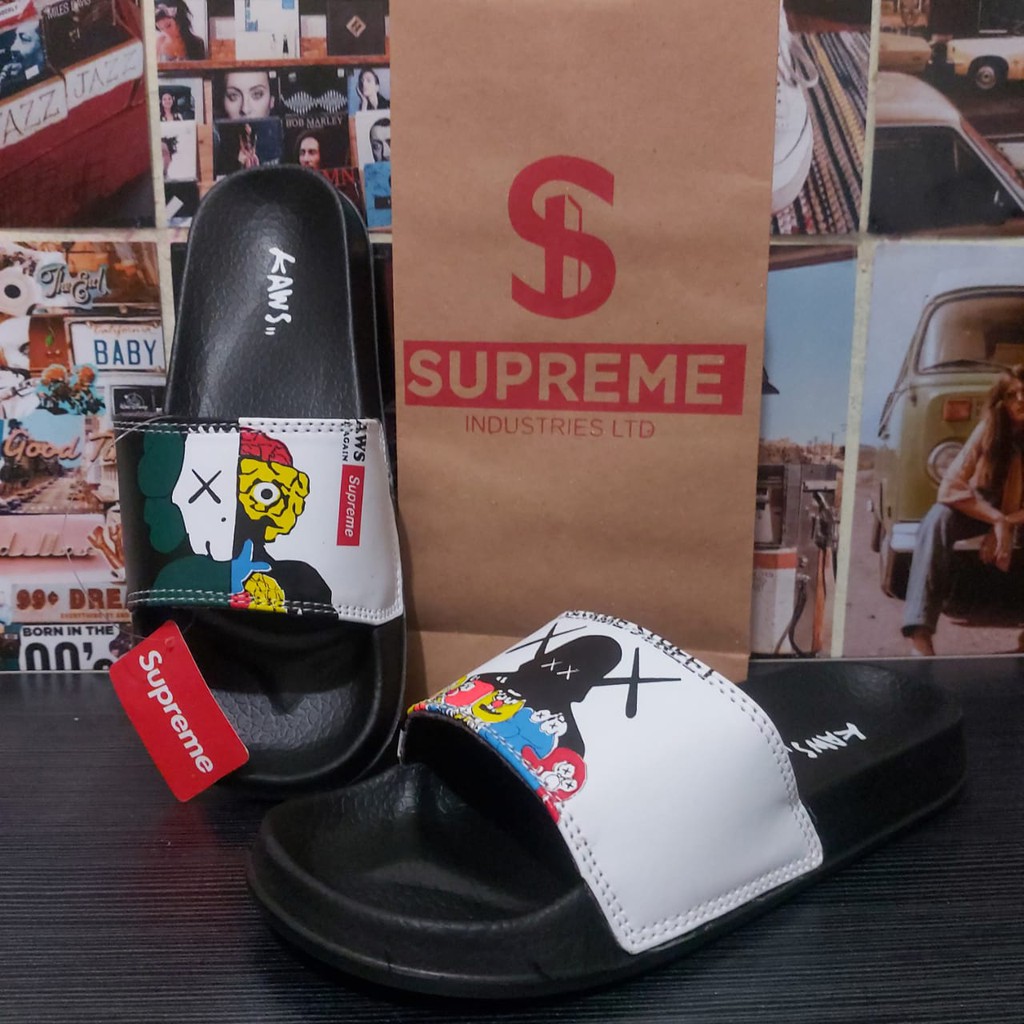 SANDAL KAWS ORIGINAL SENDAL SUPREME SESAME STREET SENDAL SLOP SLIDE ALIEN COD PRIA WANITA TERMURAH SANDAL SLOP SENDAL SELOP TERMURAH SANDAL SUPRIME ORIGINAL