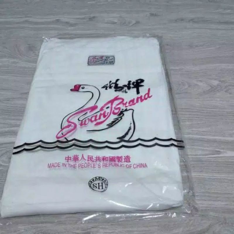 KAOS OBLONG SWAN SH  BAHAN CATTON