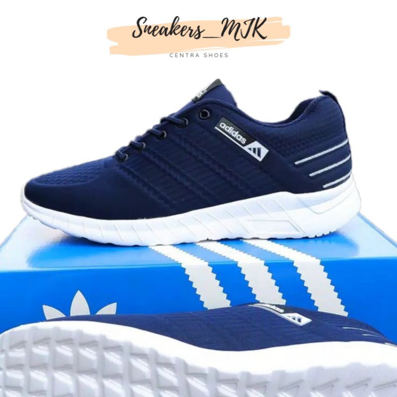 Sepatu Sneakers Pria Emboss Line 38-43