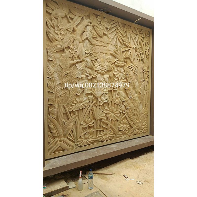 relief batu alam motif pemandangan