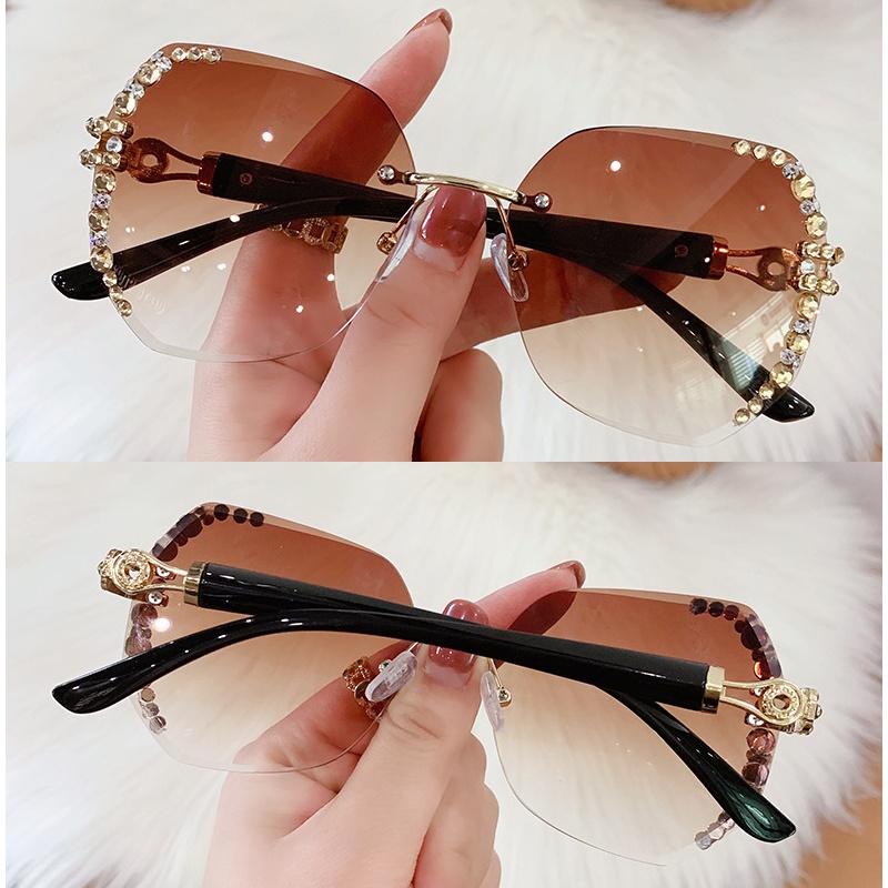 Kacamata Hitam Tanpa Bingkai Pelindung UV Gaya Vintage Untuk Wanita