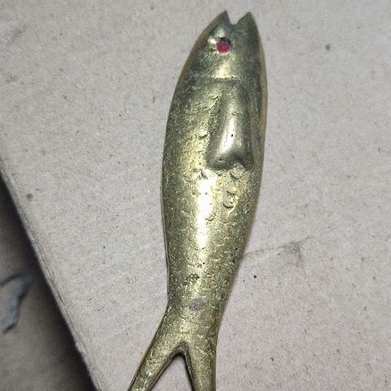 Antik mustika ikan kuningan