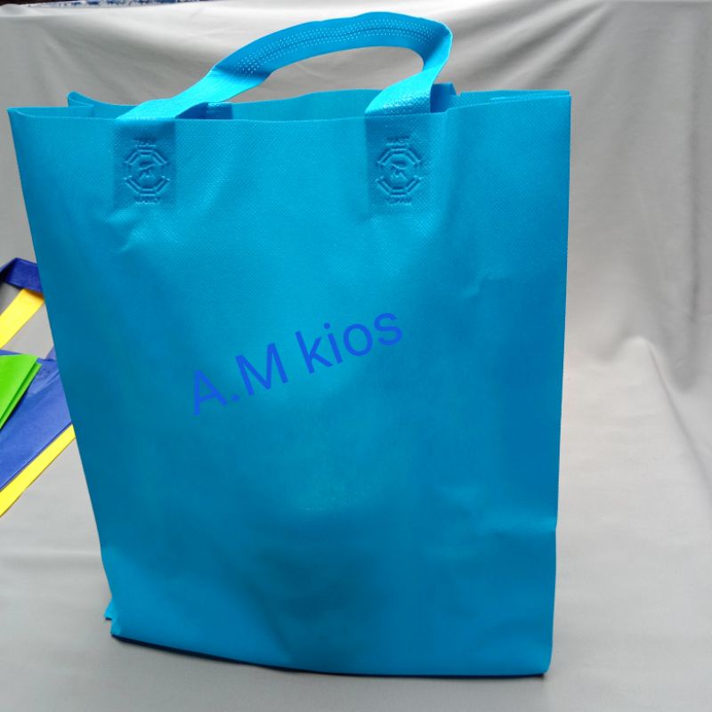 

Goodie bag polos, tas spunbond, tas sovenir, hampers kain, HLS, Ukuran 25x35 cm