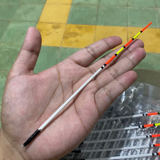 Pelampung kumbul merak panjang