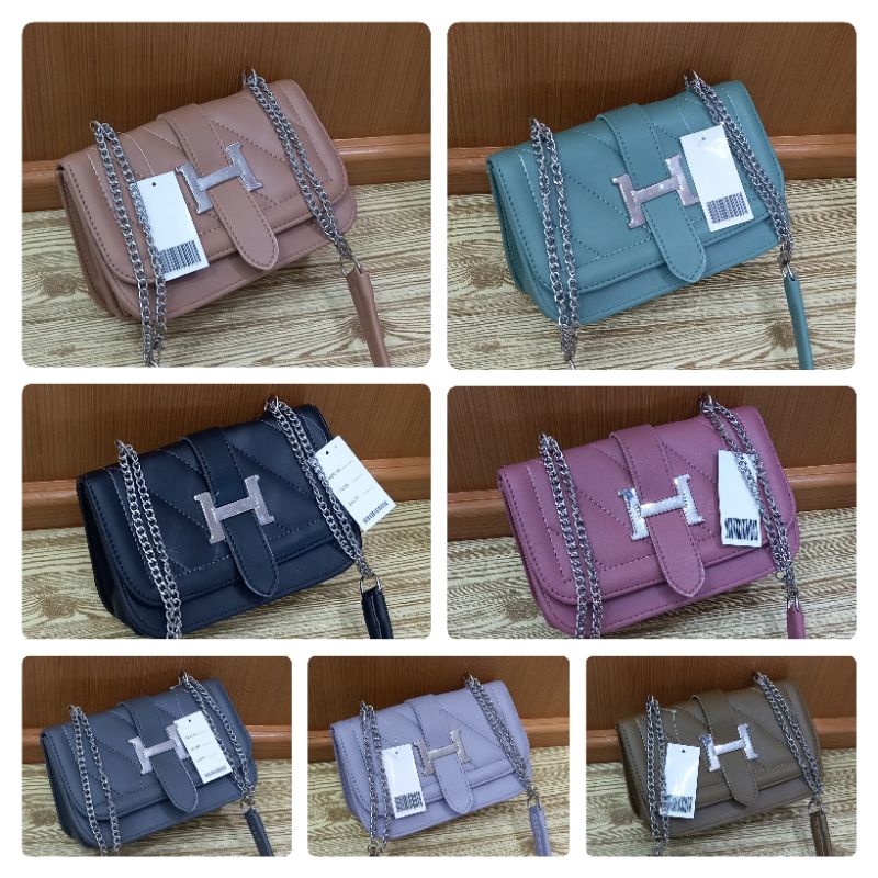 TAS SLEMPANG SNOW TALI RANTE LIDAH H SIZE 21X16CM