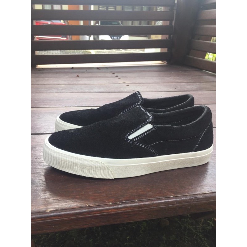 Rebellion Slip on black white