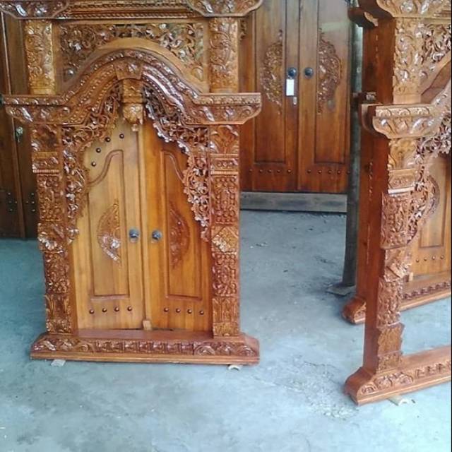 Jendela ukir bahan kayu jati