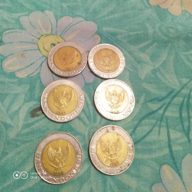 Uang koin 1000 lama kelapa sawit