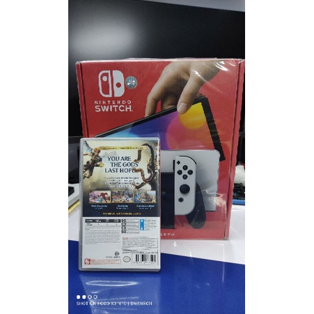 Nintendo Switch OLED White + game immortal fenyx