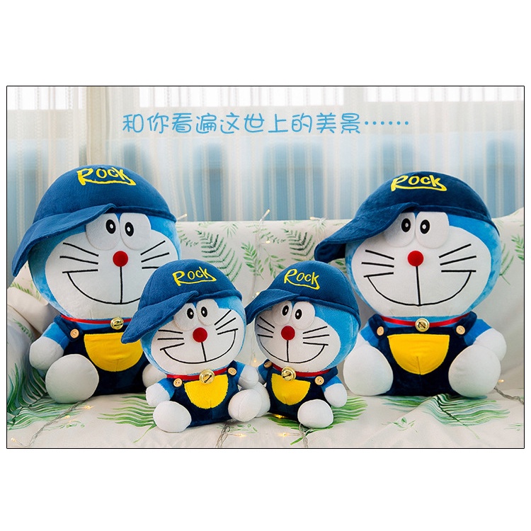 Boneka doraemon kostum pakai topi rock bahan plush