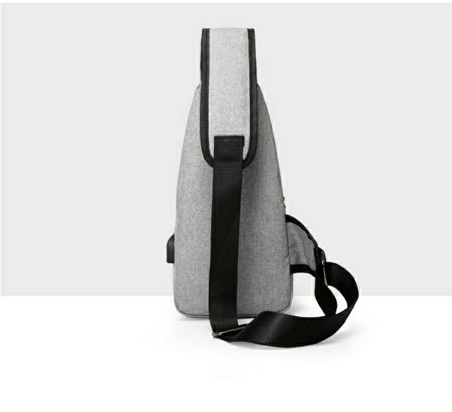 Tas Selempang USB charger HP Best Seller Sling Bag untuk di dada dan bahu IMPOR PREMIUM QUALITY