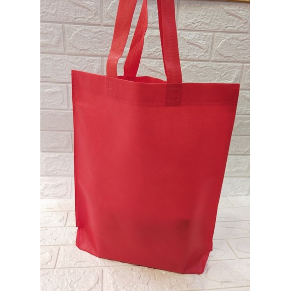 

Goddie bag Bahan spondbond/Handle Lipat pres samping 37x40x8 isi 12pcs