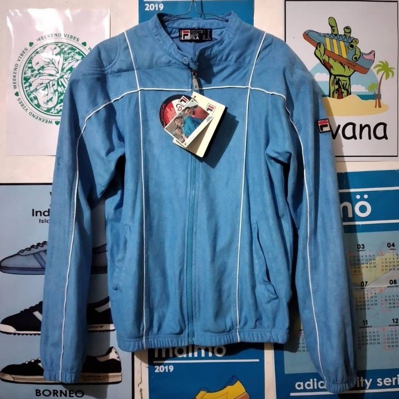 tracktop ellesse caprini