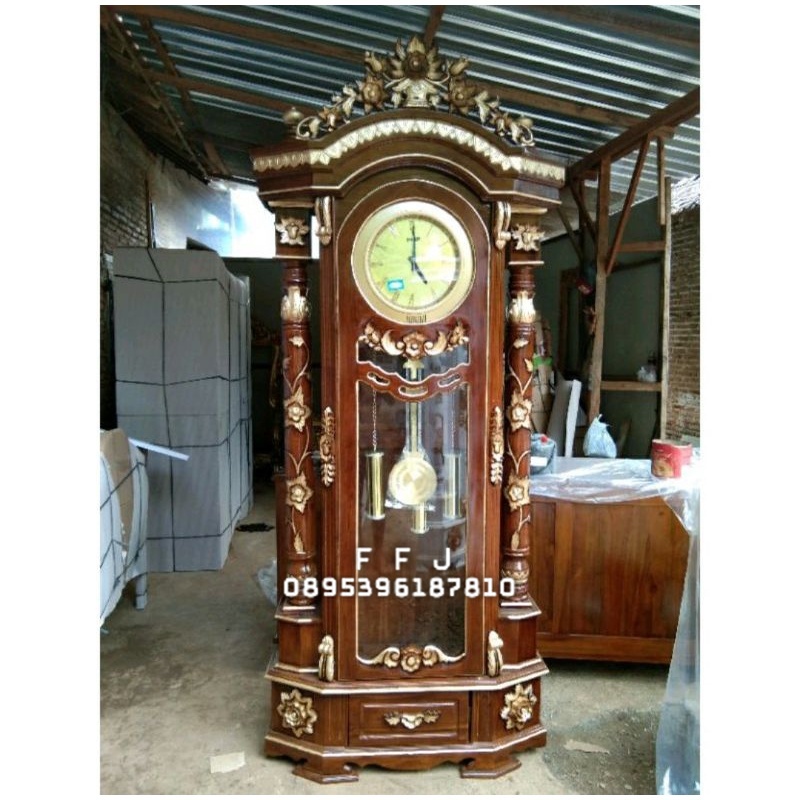 lemari jam hias masjid lemari jam ukir Jepara lemari jam pajangan