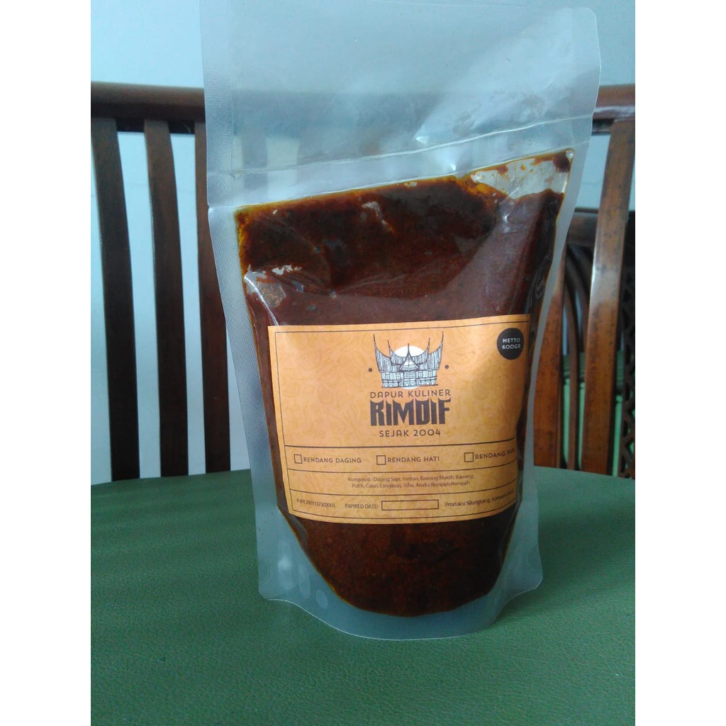 

Rendang daging sapi Khas padang dengan Kayu bakar