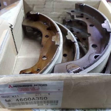 kampas rem belakang mirage (asli)