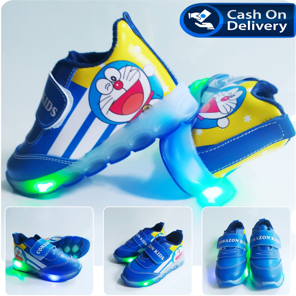 Sepatu sneaker lampu led mtif dora emon terbaru cod 1-5 thn