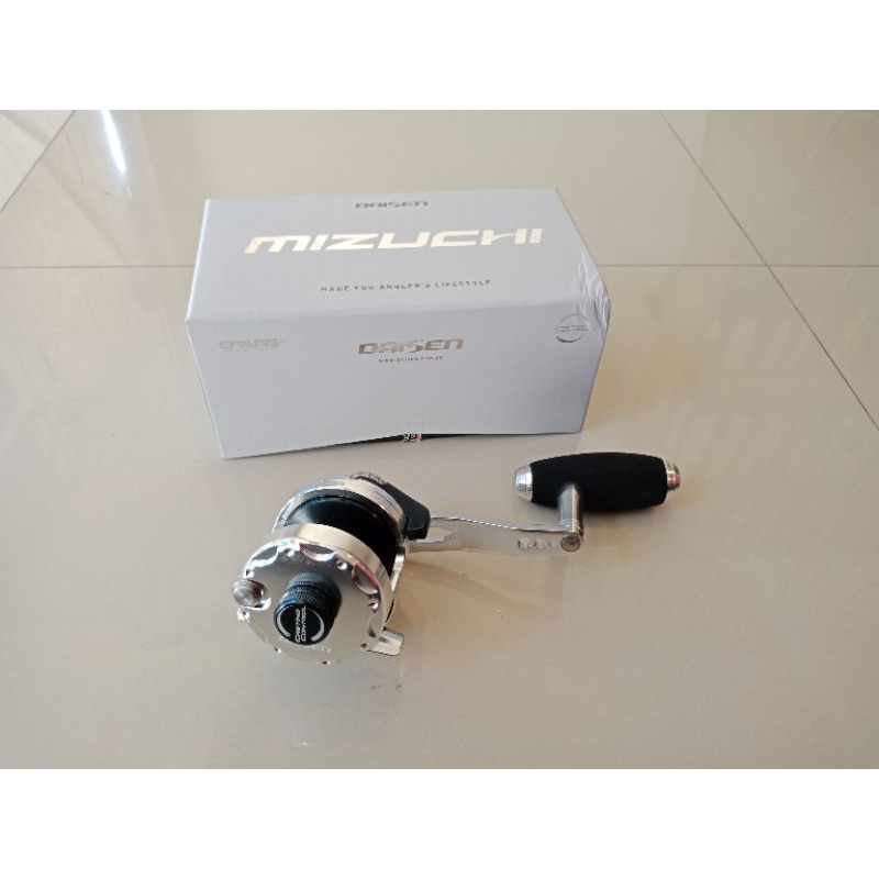 Reel OH Gawas Mizuchi Daisen 1000 HG (kanan)