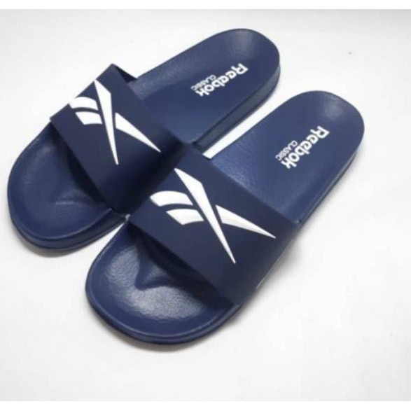 ✔️Hot Offer❗ - SANDAL REEBOK PRIA  SENDAL SLOP SPORT SLIDE PRIA  IMPORT GRADE ORI FLIP FLOP