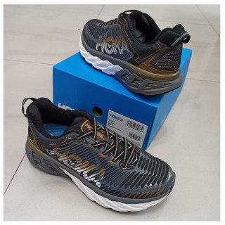 hoka cream and gold