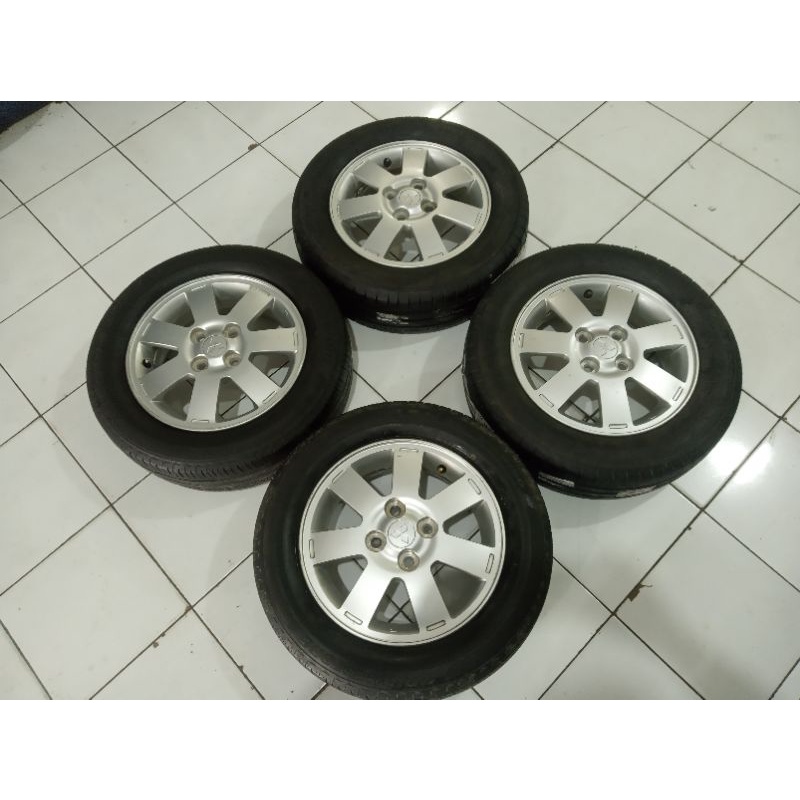 velg mobil bekas ring 14 baut 4x100 copotan mirage plus ban kondisi 80%