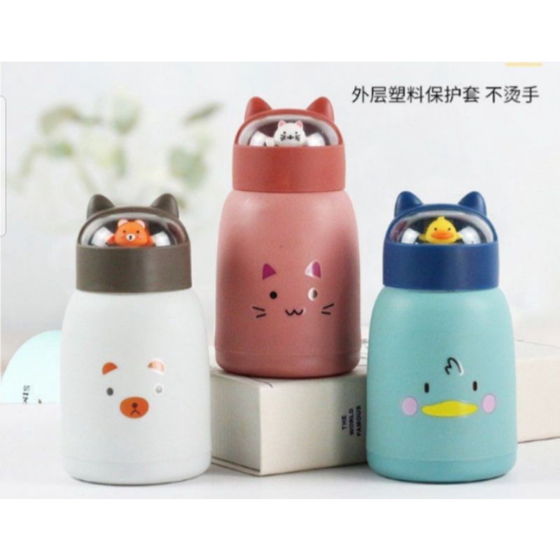 BOTOL MINUM KACA MOTIF KEPALA BONEKA