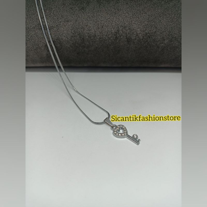 (PROMO)Kalung Titanium plus liontin Kunci Terlaris dan terbaru anti karat