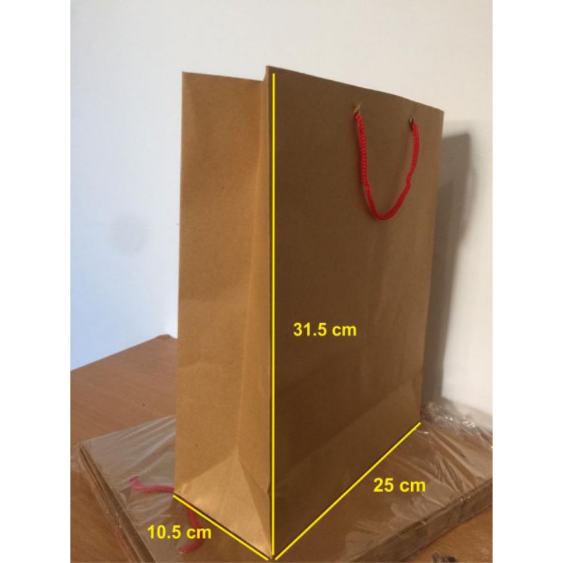 

PAPERBAG POLOS MURAH PAPERBAG WARNA COKLAT CRAFT UKURAN 25X10,5X31,5 CM GOODIE BAG