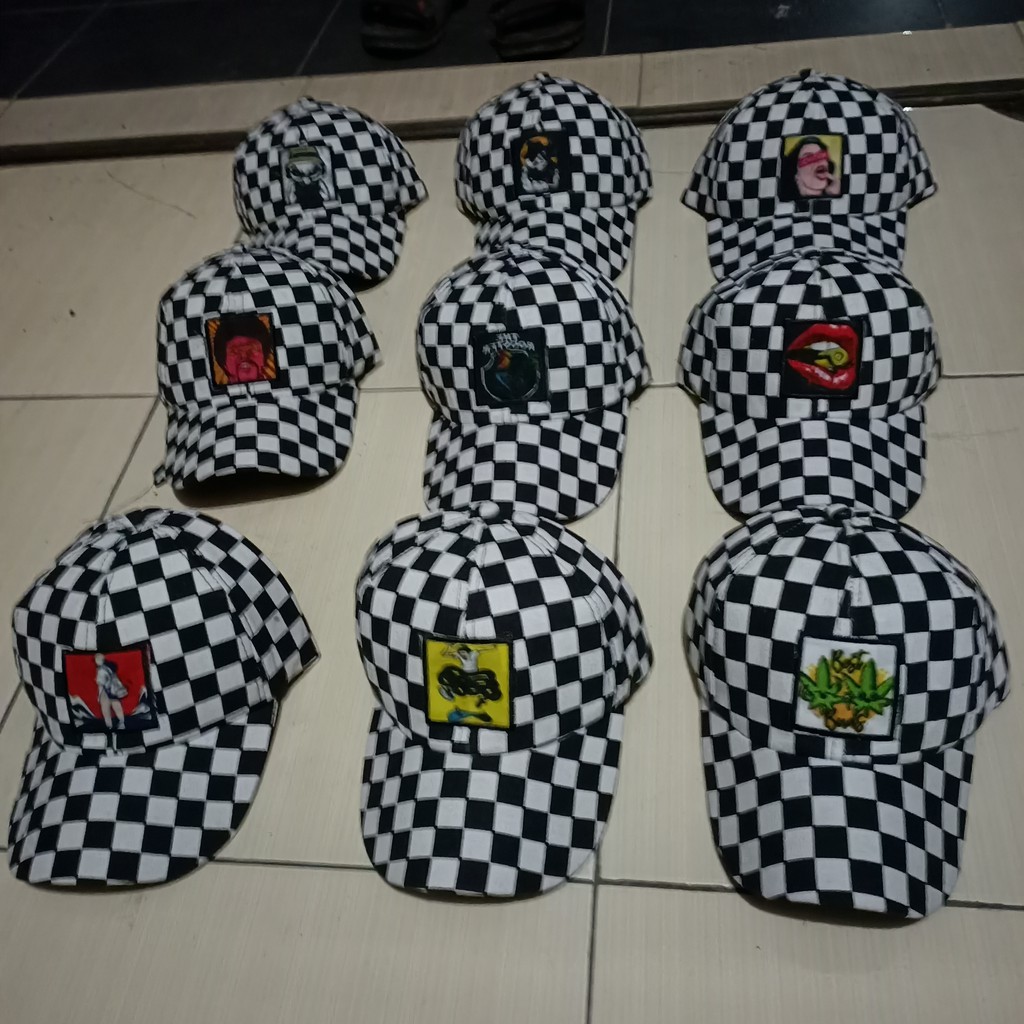 Topi bordir catur problem